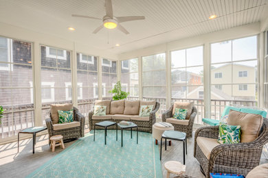 Inspiration for a large coastal gray floor sunroom remodel in Other with a standard ceiling
