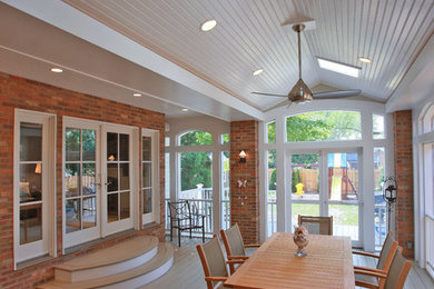 Inspiration for a transitional sunroom remodel in DC Metro with a skylight