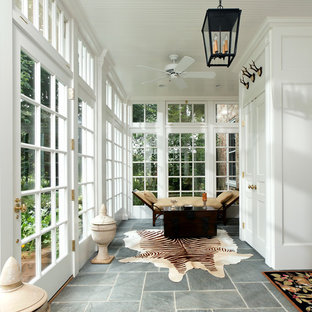 Sunroom - large traditional gray floor and slate floor sunroom idea in DC Metro with a standard ceiling and no fireplace