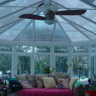 Example of a mid-sized classic ceramic tile sunroom design in New York with a skylight
