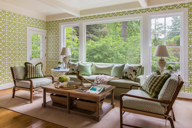 Example of a transitional light wood floor and beige floor sunroom design in Portland
