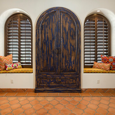 Inspiration for a large mediterranean terra-cotta tile and orange floor sunroom remodel in Phoenix