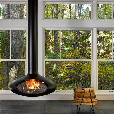 Sunroom - mid-sized modern slate floor sunroom idea in Baltimore with a hanging fireplace and a standard ceiling