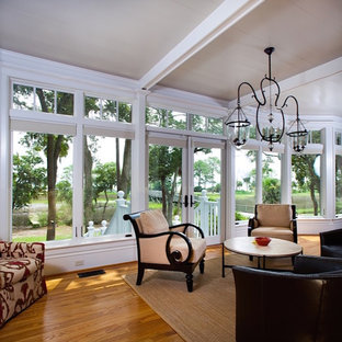 Sunroom - large coastal light wood floor and white floor sunroom idea in Atlanta with no fireplace and a standard ceiling