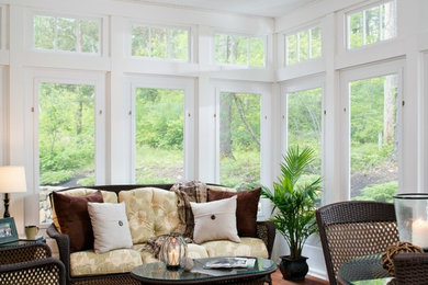 Example of a large eclectic dark wood floor and brown floor sunroom design in Nashville with a standard ceiling