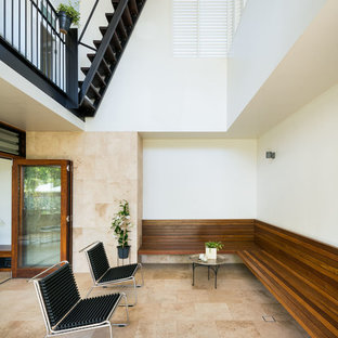 Inspiration for a contemporary sunroom in Brisbane with a standard ceiling and beige floor.