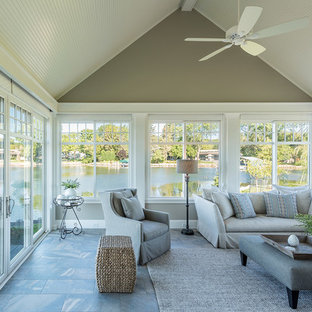 Inspiration for a large timeless ceramic tile and gray floor sunroom remodel in Minneapolis with no fireplace and a standard ceiling