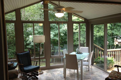 Example of a mid-sized ceramic tile sunroom design in Indianapolis with a standard ceiling