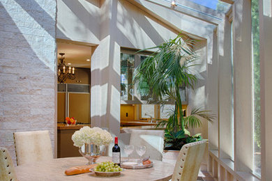 Inspiration for a transitional ceramic tile sunroom remodel in Los Angeles with no fireplace