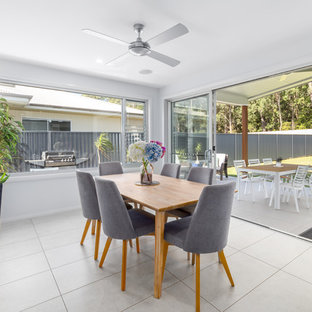 Inspiration for a beach style sunroom in Other with a standard ceiling and beige floor.