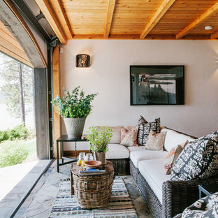 Foto de galería de estilo americano, de tamaño medio, sin chimenea, con suelo de pizarra, techo estándar y suelo azul
