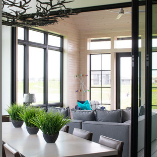 Inspiration for a contemporary sunroom remodel in Other