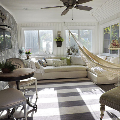 Inspiration for a mid-sized coastal linoleum floor and gray floor sunroom remodel in Other with a standard ceiling and no fireplace