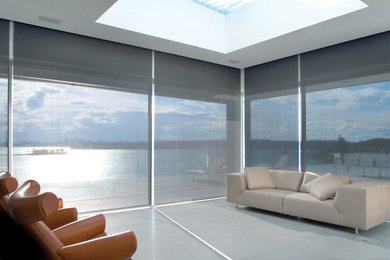 Inspiration for a medium sized nautical conservatory in Tampa with porcelain flooring, no fireplace and a skylight.