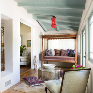 Design ideas for a mediterranean conservatory in Los Angeles with a standard ceiling and terracotta flooring.
