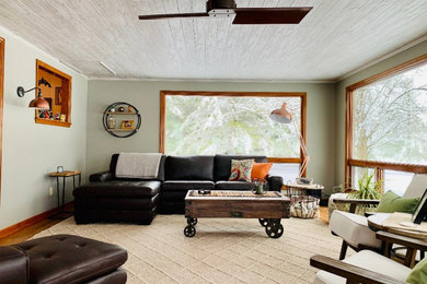 Large cottage chic medium tone wood floor and brown floor sunroom photo in Cincinnati with no fireplace