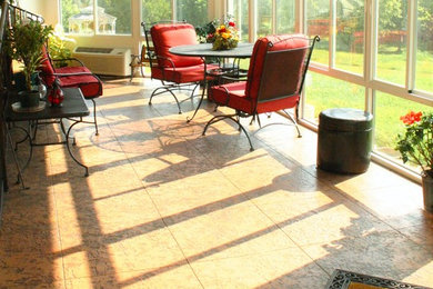 Sunroom - large traditional concrete floor sunroom idea in Other with no fireplace and a standard ceiling