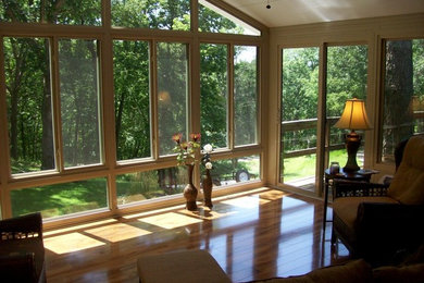 Inspiration for a mid-sized sunroom remodel in Other