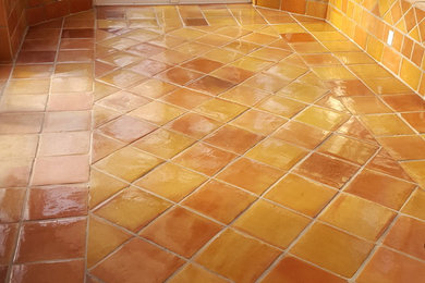 Inspiration for a rustic terra-cotta tile sunroom remodel in New York