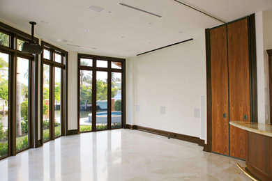 Example of a large trendy ceramic tile and beige floor sunroom design in Miami with a standard ceiling