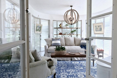 Inspiration for a mid-sized transitional ceramic tile and white floor sunroom remodel in Tampa with no fireplace and a standard ceiling