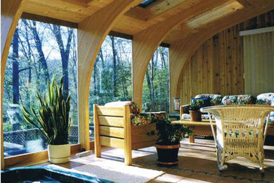 Example of a mid-sized mountain style ceramic tile sunroom design in Boston with no fireplace and a skylight