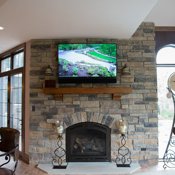 TV and Surround Sound Over Fireplace