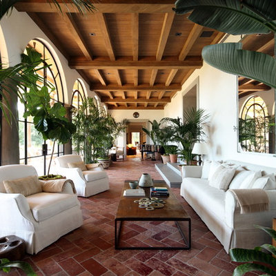 Inspiration for a mediterranean terra-cotta tile and orange floor sunroom remodel in Los Angeles with a standard ceiling