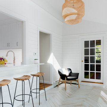 White Transitional Kitchen, Dining and Sunroom Renovation