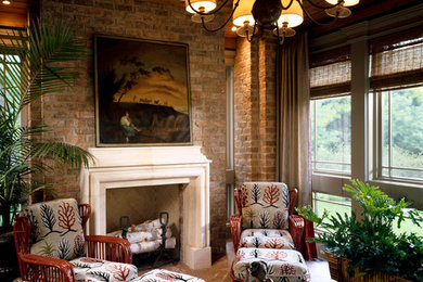Sunroom - mid-sized traditional limestone floor sunroom idea in Chicago with a standard fireplace and a stone fireplace