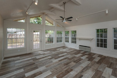 Example of a mountain style sunroom design in Orlando