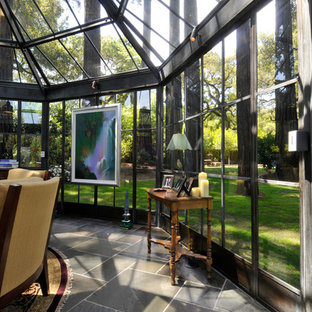 Example of a large eclectic porcelain tile sunroom design in San Francisco with a glass ceiling and no fireplace