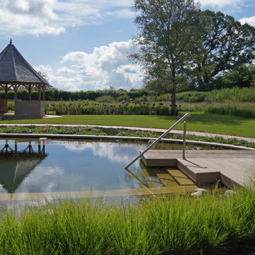 A natural swimming pool and summer house...