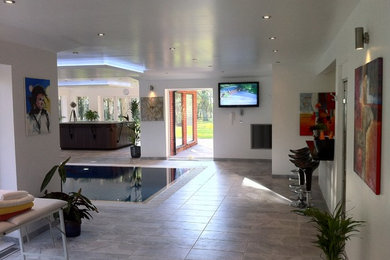 Photo of a contemporary swimming pool in Essex.