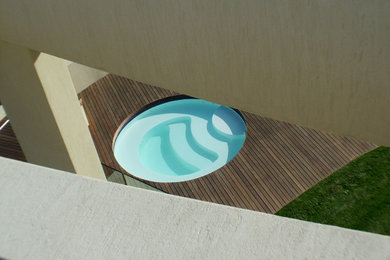 Inspiration for a contemporary swimming pool in Other.