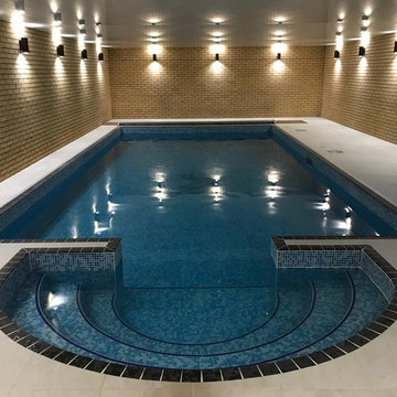 Finished indoor pool room and pool renovation.