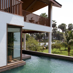 Inspiration for an asian side yard custom-shaped aboveground pool in Ahmedabad.