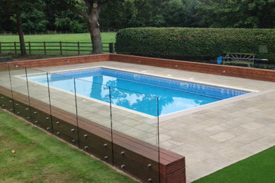 Design ideas for a modern swimming pool in Other.