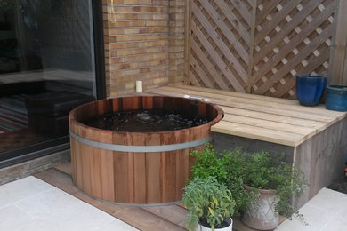 Design ideas for a medium sized rustic swimming pool in London.