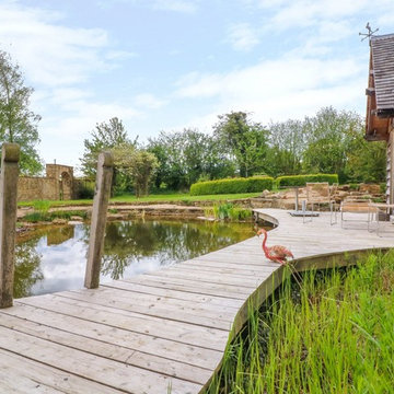 Magical, natural swimming pond with cosy pool house