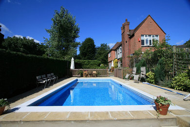 Design ideas for a classic swimming pool in Hampshire.