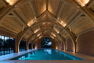 This is an example of a rustic swimming pool in Oxfordshire.