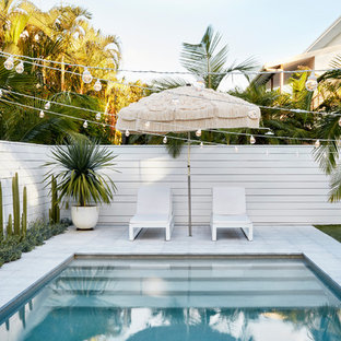 Beach style rectangular pool in Other.