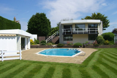 Inspiration for a modern swimming pool in Sussex.