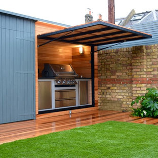 Idee per una terrazza minimal di medie dimensioni e dietro casa