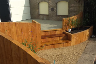 This is an example of a small contemporary back terrace in Cambridgeshire.