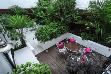 Design ideas for a medium sized contemporary back terrace with an outdoor kitchen.