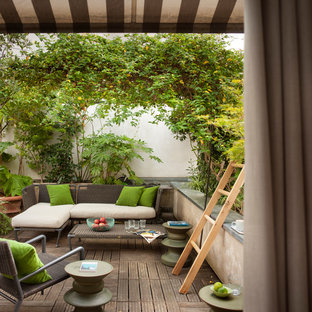 Aménagement d'une terrasse contemporaine avec aucune couverture.