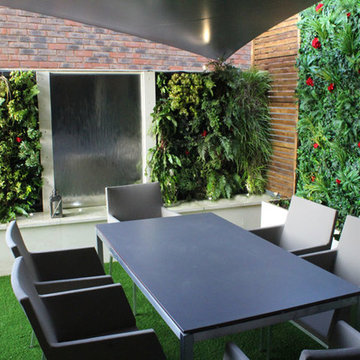 Roof Terrace Sevenoaks - Artificial grass, shade sail, green walls and lighting