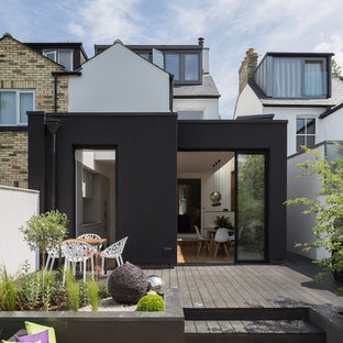 This is an example of a small contemporary back terrace in Other with no cover.